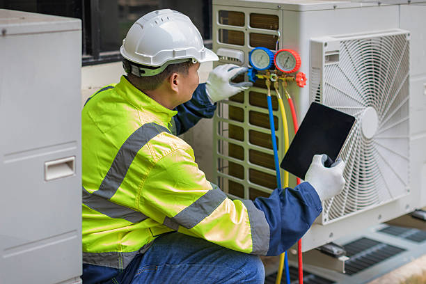 Professional Ac Installation technician working in Roxbury, MA